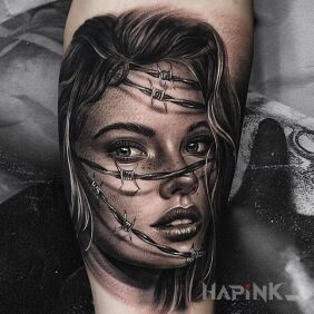 Tattoo Woman in a trap on the forearm motif: faces style: realistic