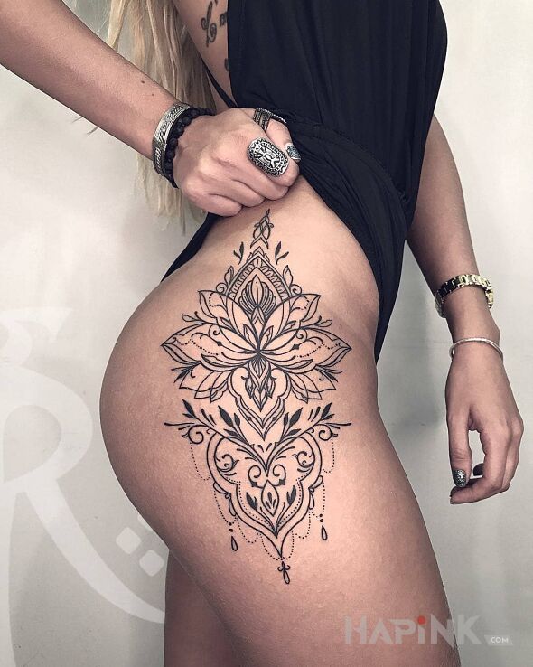 Tattoo Kwiat lotosu wzbogacony ornamentami in ornaments motif and graphic / illustrative style on the buttocks