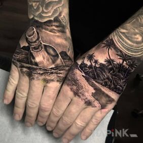Tattoo Bottle with a letter On the arm motif: black and gray style: realistic