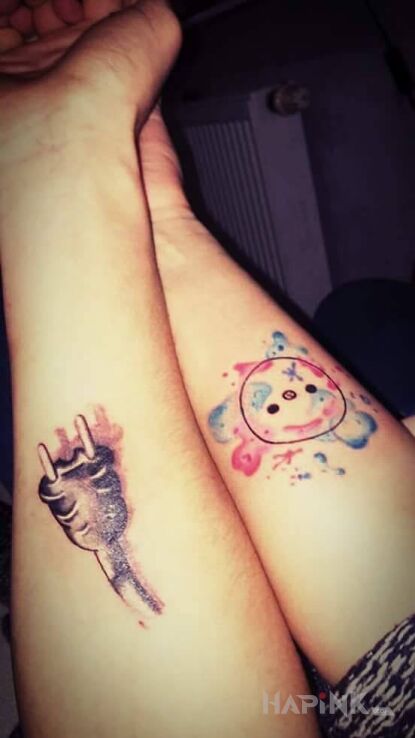 Tattoo Dziara dla pary in Love motif on the forearm