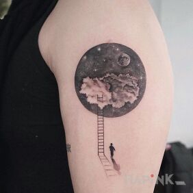 Tattoo Ladder to space on the upper arm motif: black and gray style: graphic / illustrative