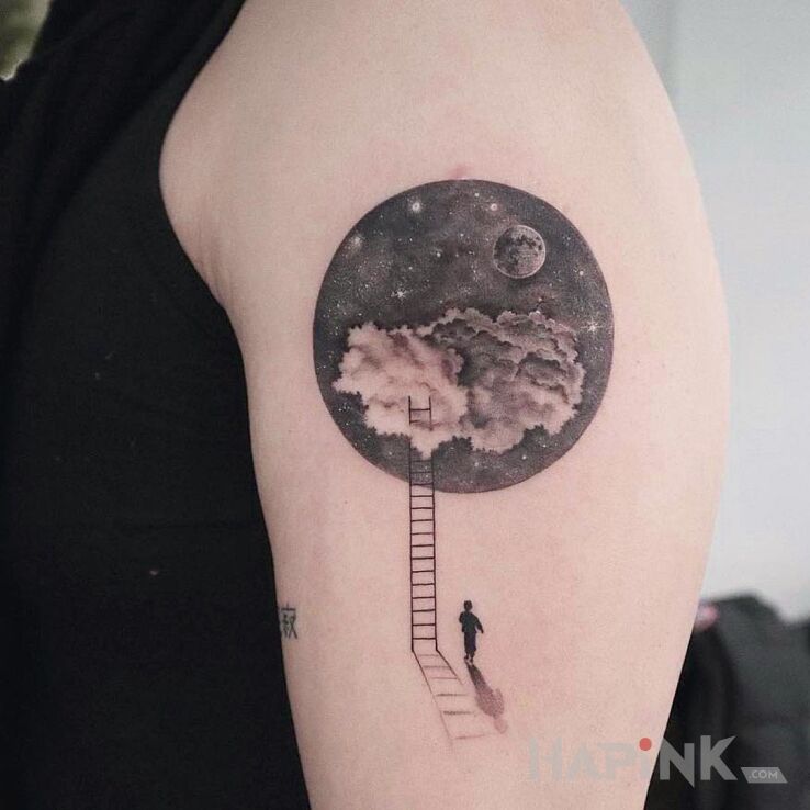 Tattoo Drabina w kosmos in black and gray motif and graphic / illustrative style on the upper arm