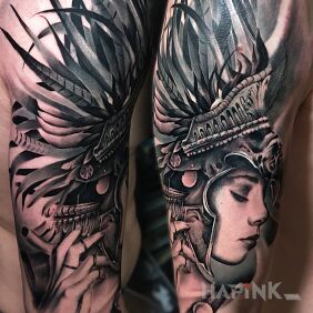 Tattoo Warrior on the upper arm motif: faces style: realistic