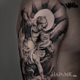 Tattoo Angel on the upper arm motif: religious style: graphic / illustrative