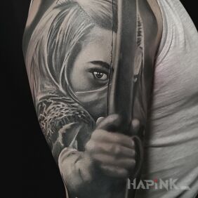 Tattoo Archer on the upper arm motif: 3D style: realistic