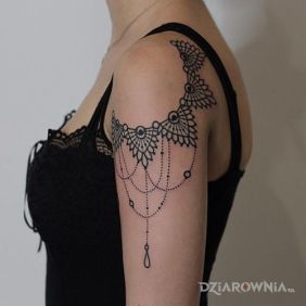 Tatuaż Ozdobione ramię na ręce motyw: ornamenty styl: graficzne / ilustracyjne