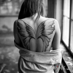 Tattoo Butterfly Wings on the shoulder blades motif: black and gray style: graphic / illustrative