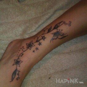 Tattoo Flowers, butterflies on the leg motif: butterflies