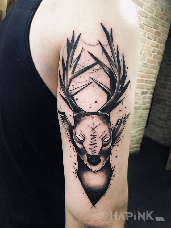Tattoo Jelonek in black and gray motif and graphic / illustrative style On the arm