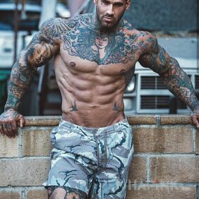Tattoo Piece of a man on the shoulder motif: sleeves style: graphic / illustrative