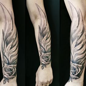 Tattoo Rose wings on the forearm motif: flowers style: realistic