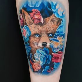 Tattoo Fox on the forearm motif: flowers style: realistic