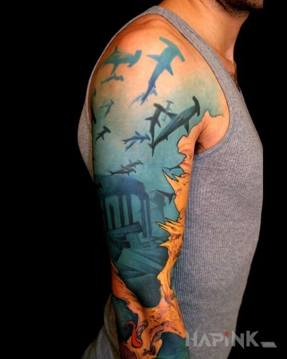 Tattoo Rekiny in sleeves motif on the upper arm