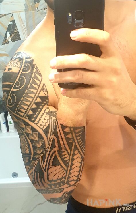 Tattoo POLINEZJA DAWID in black and gray motif and Polynesian style on the forearm