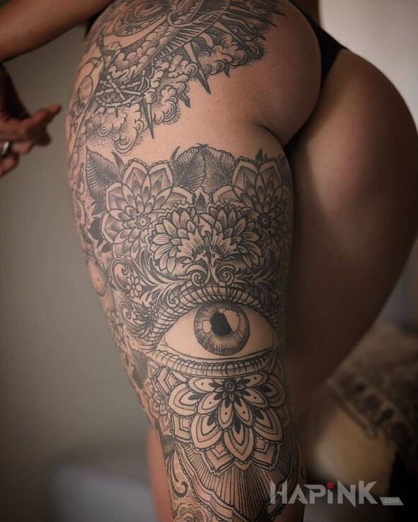 Tattoo Oko na udonie in mandalas motif and graphic / illustrative style on the leg