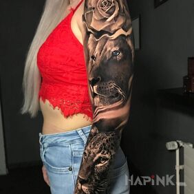 Tattoo Lion and cheetah On the arm motif: black and gray style: realistic