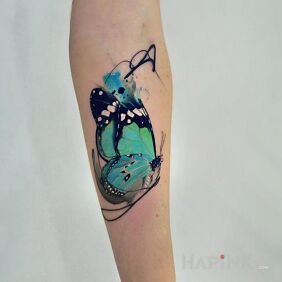 Tattoo Beautiful butterfly on the forearm motif: butterflies style: realistic