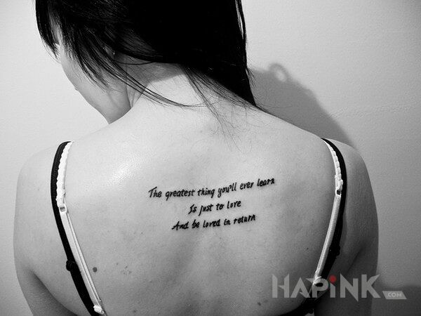 Tattoo O milosci in lettering motif on the back