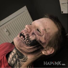 Tattoo Deadman on the throat motif: black and gray style: realistic