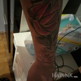 Tattoo Rose on the forearm motif: flowers style: Watercolor