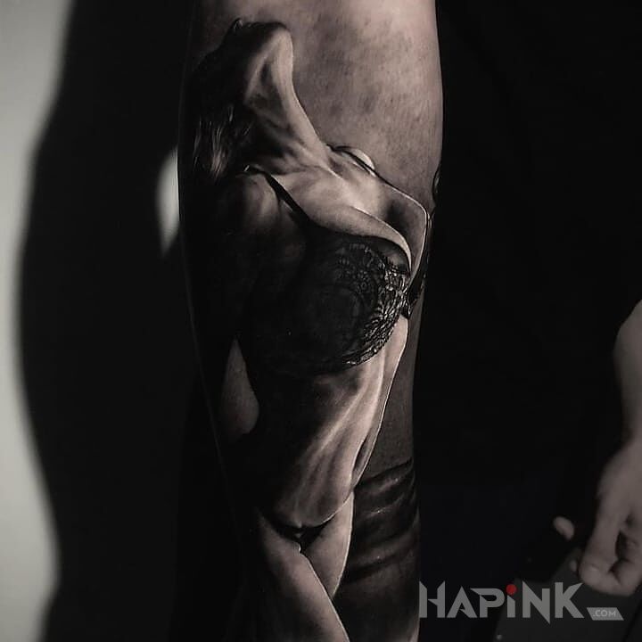 Tattoo Porno tattoo in 3D motif and realistic style On the arm