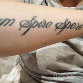 Tattoo Dum spiro spero on the forearm motif: lettering