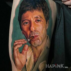 Tattoo Scarface on the thigh motif: colorful style: realistic