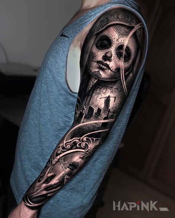 Tattoo Santa Muerte i cmentarz in santa muerte motif and realistic style on the forearm
