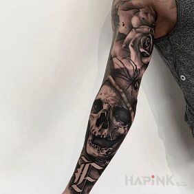 Tattoo Skull without teeth on the forearm motif: sleeves style: realistic