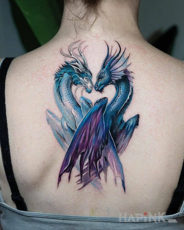 Tattoo Smok i smoczyca in dragons motif and graphic / illustrative style on the back