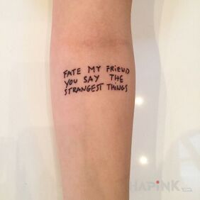 Tattoo What fate says on the forearm motif: lettering