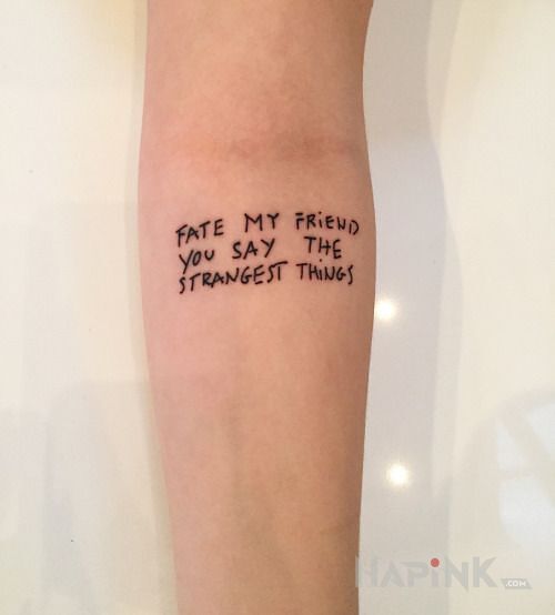 Tattoo Co mowi los in lettering motif on the forearm