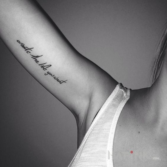 Tattoo Stworz zycie dookola siebie in lettering motif On the arm