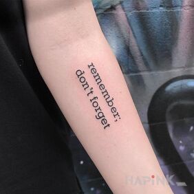 Tattoo Remember not to forget on the forearm motif: lettering
