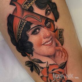 Tattoo Devil in a woman on the leg motif: faces style: realistic