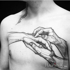 Tattoo Hand in hands on the chest motif: black and gray style: sketch