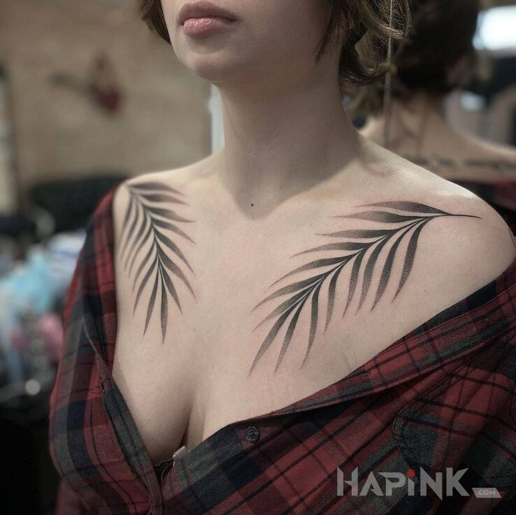 Tattoo Dwie wycieniowane gałązki in black and gray motif and graphic / illustrative style on the chest
