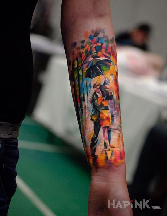 Tattoo Taniec w deszczu in characters motif on the forearm
