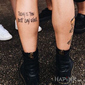 Tattoo The best day on the calf motif: lettering
