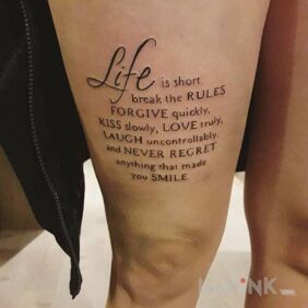 Tattoo Life is short on the thigh motif: lettering