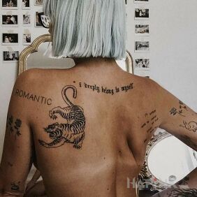 Tattoo Romantic tiger on the shoulder blades motif: animals style: graphic / illustrative