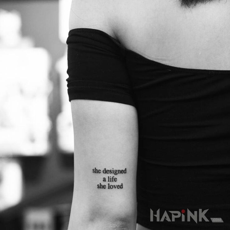 Tattoo Projektowanie własnego życia in lettering motif On the arm