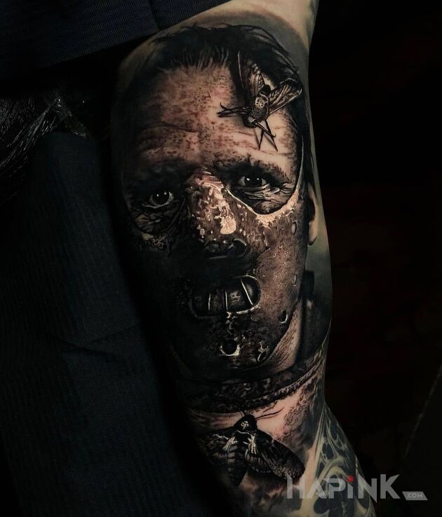 Tattoo Mroczny Hannibal Lecter in 3D motif and realistic style on the upper arm