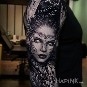Tattoo Valkyrie on the upper arm motif: faces style: realistic