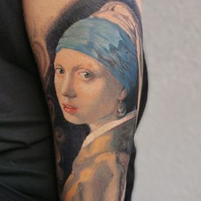 Tattoo Girl with a Pearl Earring On the arm motif: colorful style: realistic