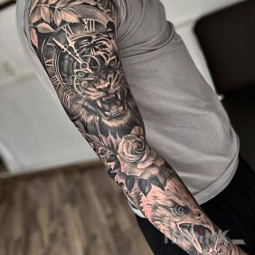 Tattoo Tiger and eagle on the upper arm motif: animals style: realistic