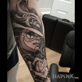 Tattoo Clown girl on the forearm motif: characters