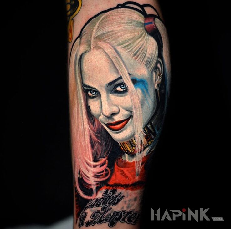 Tattoo Harley Quinn in characters motif on the forearm