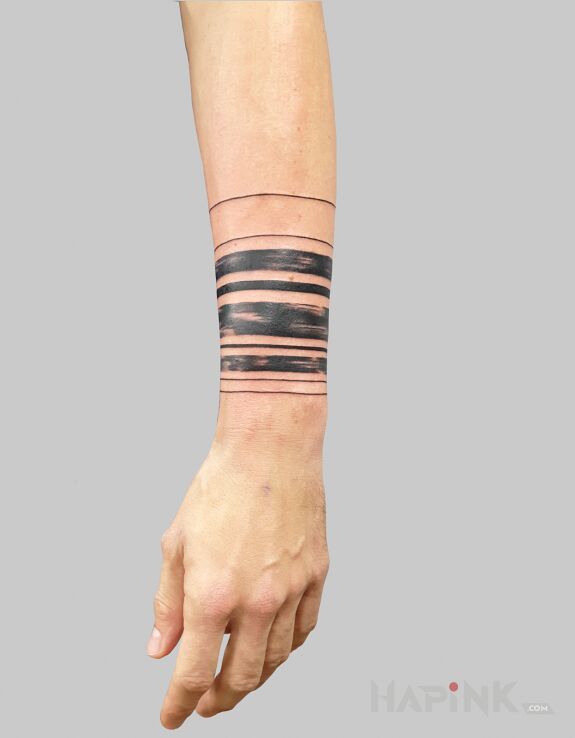 Tattoo Męski armband in other motif and blackwork / blackout style on the forearm
