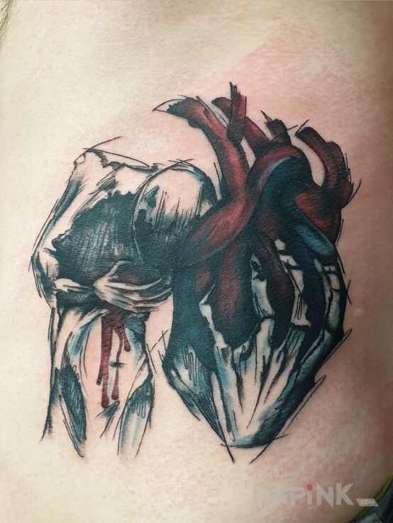 Tattoo Inflames in demons motif and abstract style on the ribs